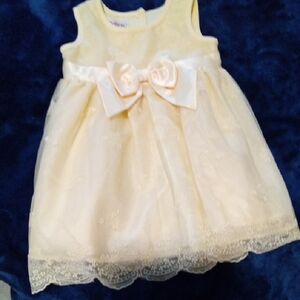 Charming Cream Sleeveless Kids Dress with Bow